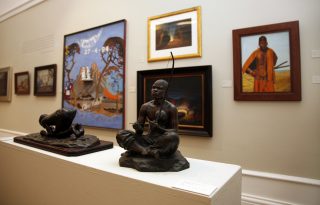 Anton van Wouws bronze sculptures in the foreground with Wayne Barkers Blue Colonies